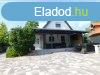 Feljtott, medencs csaldi hz a Balaton part kzelben! -