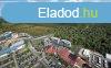 Elad j pts, kertkapcsolatos laks Hvz kzpontjban -