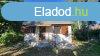 Tiszalcon 1238 m2-es vzparti telek 40m2 htvgi hzzal ela